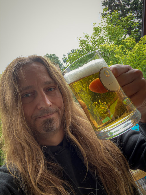 Photo showing me, Marc, rising a pint for Scott Whitehead, who died at the age of 39.