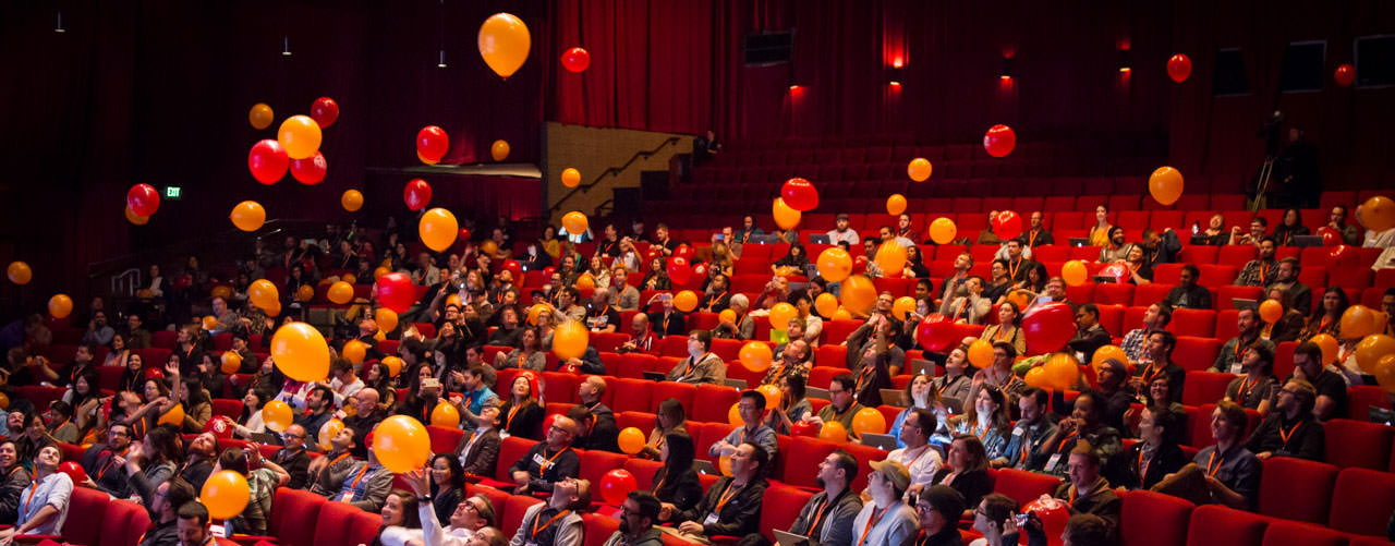 Photos of flying balloons at Smashing Conference