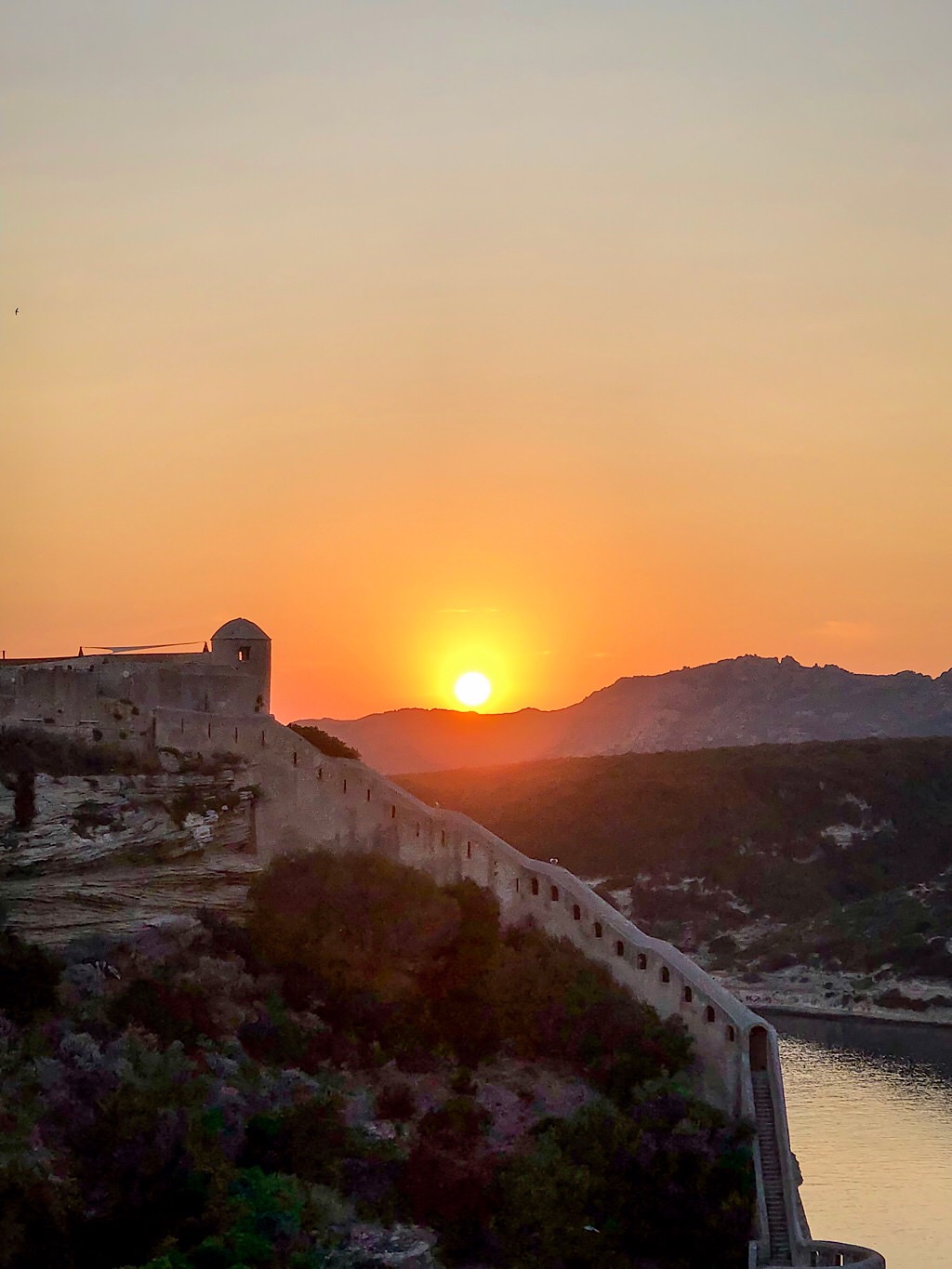 A photo showing a sunset from Bonifacio on Corsica